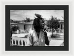 Peter Tosh Burning A Spliff In His Front Yard With His Parrot Freddie - Framed Print