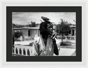 Peter Tosh Burning A Spliff In His Front Yard With His Parrot Freddie - Framed Print