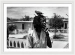 Peter Tosh Burning A Spliff In His Front Yard With His Parrot Freddie - Framed Print