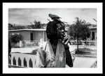 Peter Tosh Burning A Spliff In His Front Yard With His Parrot Freddie - Framed Print