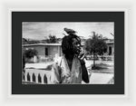 Peter Tosh Burning A Spliff In His Front Yard With His Parrot Freddie - Framed Print