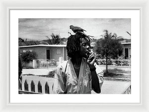 Peter Tosh Burning A Spliff In His Front Yard With His Parrot Freddie - Framed Print