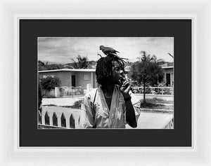 Peter Tosh Burning A Spliff In His Front Yard With His Parrot Freddie - Framed Print