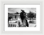 Peter Tosh Burning A Spliff In His Front Yard With His Parrot Freddie - Framed Print