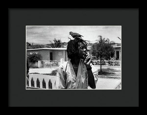 Peter Tosh Burning A Spliff In His Front Yard With His Parrot Freddie - Framed Print