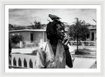 Peter Tosh Burning A Spliff In His Front Yard With His Parrot Freddie - Framed Print