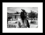 Peter Tosh Burning A Spliff In His Front Yard With His Parrot Freddie - Framed Print