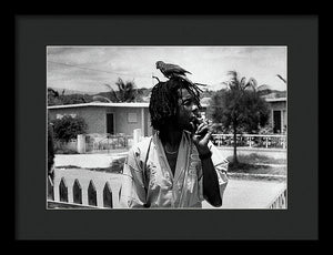 Peter Tosh Burning A Spliff In His Front Yard With His Parrot Freddie - Framed Print