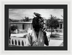 Peter Tosh Burning A Spliff In His Front Yard With His Parrot Freddie - Framed Print