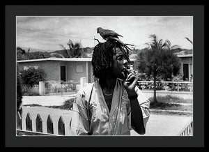 Peter Tosh Burning A Spliff In His Front Yard With His Parrot Freddie - Framed Print