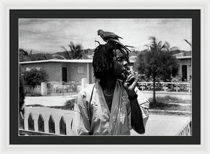 Peter Tosh Burning A Spliff In His Front Yard With His Parrot Freddie - Framed Print